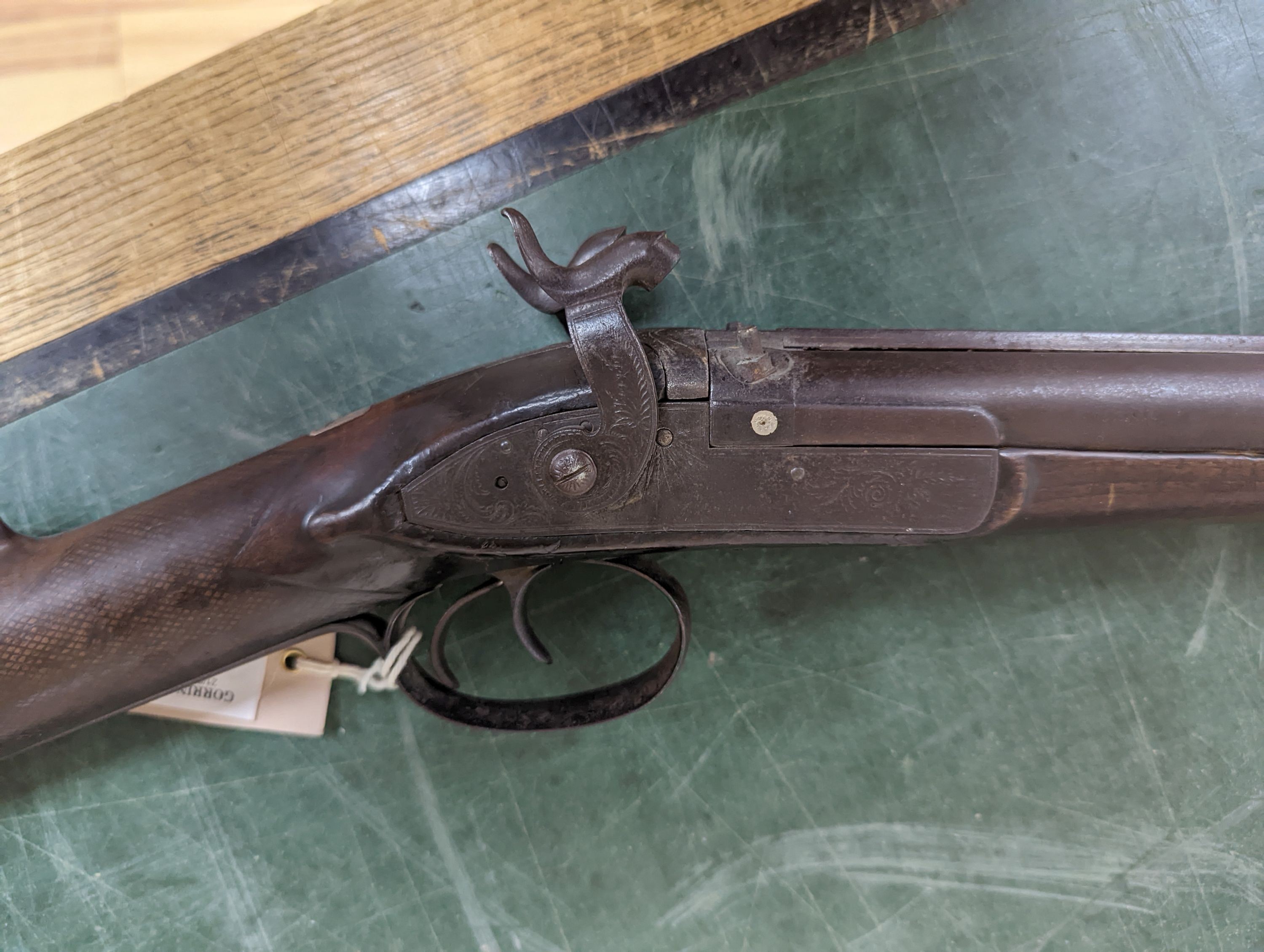 Two 19th century percussion muskets, 103cm. max., one double-barrelled